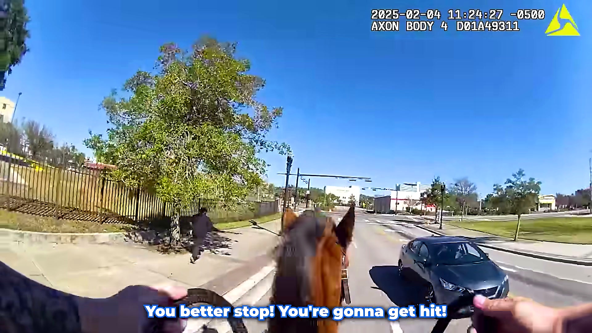 A mounted officer and police horse close distance during the police horse chase.