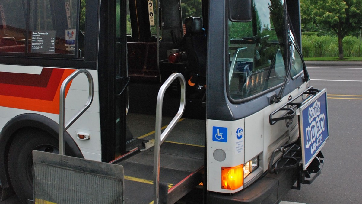 Raised transit bus wheelchair lift for adaptive mobility equipment recall context