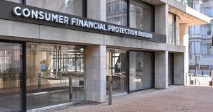 Consumer Financial Protection Bureau entrance in Washington DC illustrating auto loan shopping guide