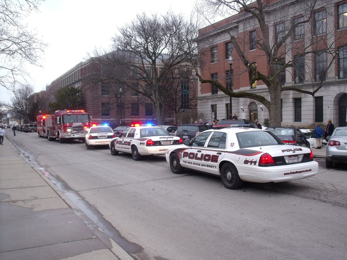 Emergency responders and vehicles at an active scene on a public roadway