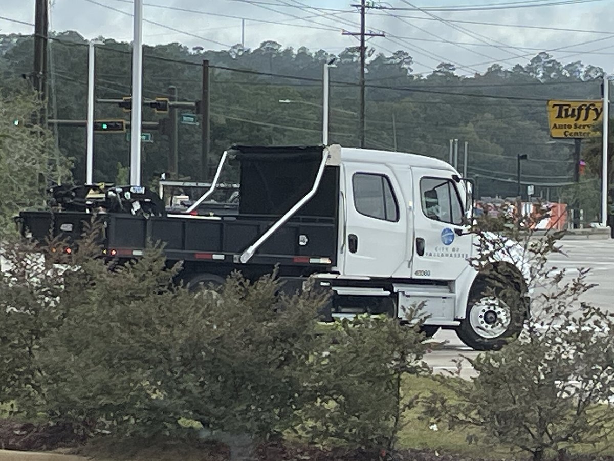 Freightliner M2 crew cab dump truck in municipal service