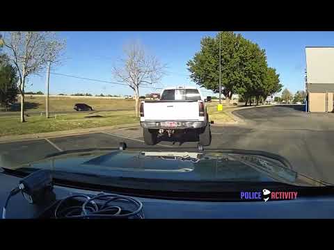 lifted Chevy pickup truck, source video frame 1