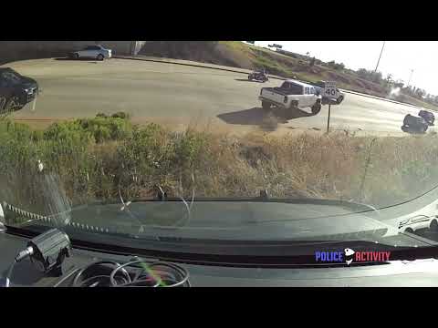 lifted Chevy pickup truck, source video frame 2