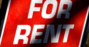 For Rent yard sign outside a residential property