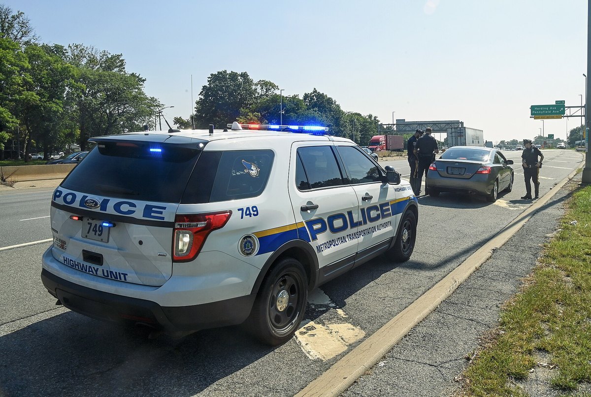 Suspended plates stop - police patrol vehicle conducting traffic stop
